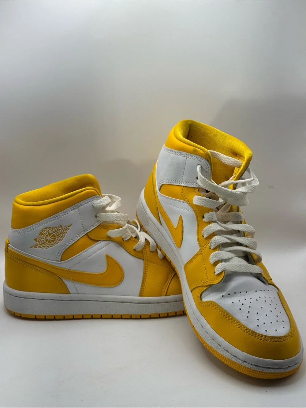 Nike Air Jordan Men’s 9 High Top Sneakers in Yellow and White